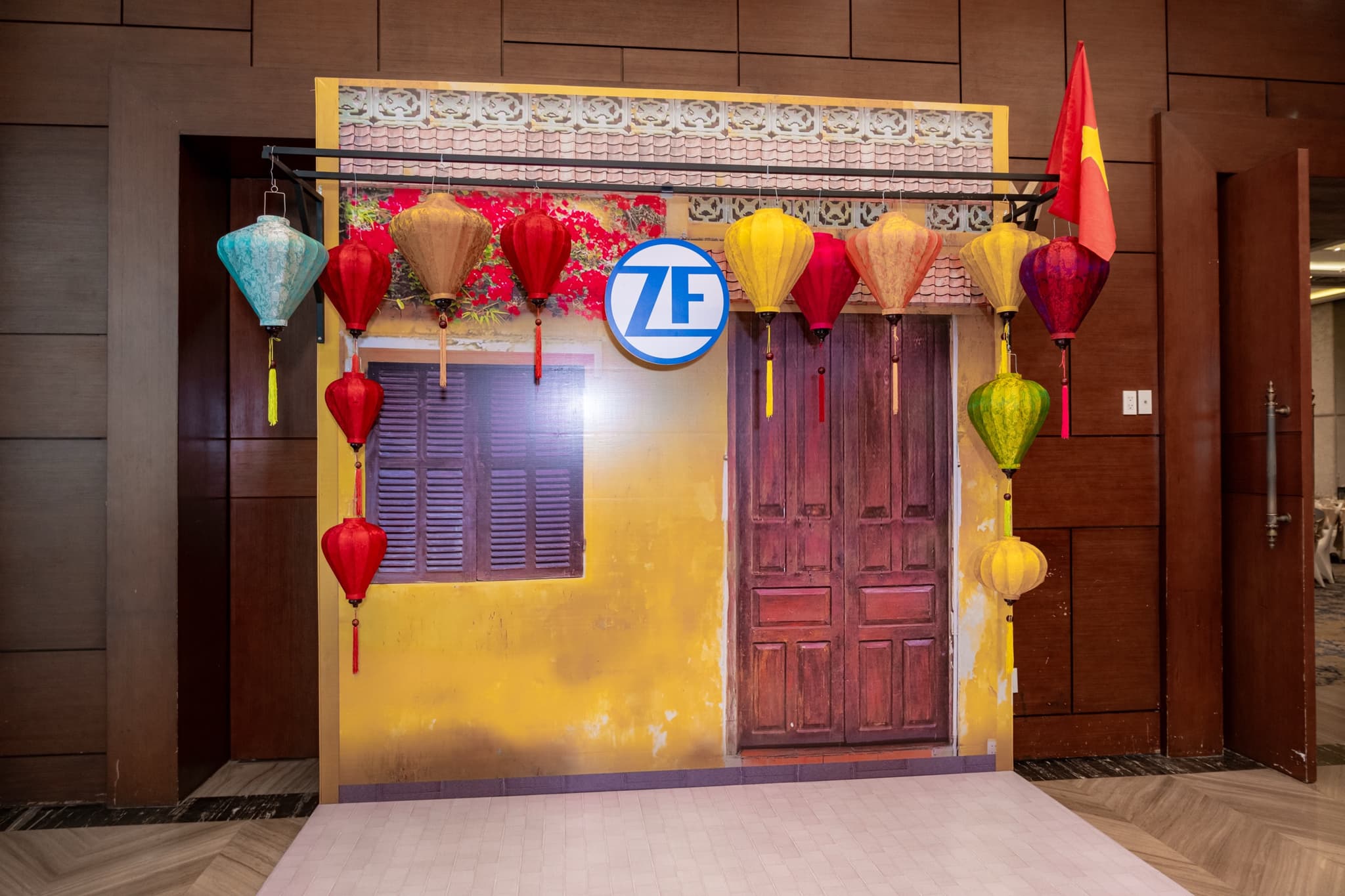 ZF Welcome set framed in Hoi An silk lanterns and cultural staging